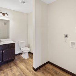 wood floor bathroom at Rivertown Residential Suites located in Monticello, MN