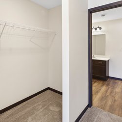 carpeted closet at Rivertown Residential Suites located in Monticello, MN